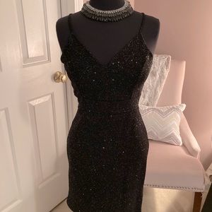Black shimmery cut out back dress